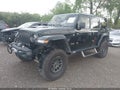 2022 Jeep Wrangler Unlimited — photo 2 of 16 | VIN 1C4JJXSJ2NW109032