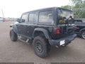2022 Jeep Wrangler Unlimited — photo 3 of 16 | VIN 1C4JJXSJ2NW109032