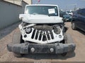 2015 Jeep Wrangler Unlimited — photo 13 of 17 | VIN 1C4HJWEG2FL744473