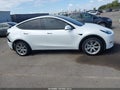 2021 Tesla Model Y — photo 14 of 17 | VIN 5YJYGAEE4MF144831