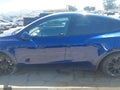 2023 Tesla Model Y — photo 14 of 19 | VIN 7SAYGDEE8PA051106