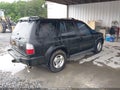 Photo 4 of 11 — 2000 Infiniti QX4