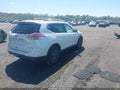 2016 Nissan Rogue — photo 4 of 16 | VIN 5N1AT2MV1GC850365