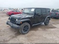 2015 Jeep Wrangler Unlimited — photo 2 of 17 | VIN 1C4BJWEG4FL583453