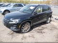 2014 Volkswagen Tiguan — photo 2 of 17 | VIN WVGBV3AX6EW510330