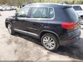2014 Volkswagen Tiguan — photo 3 of 17 | VIN WVGBV3AX6EW510330