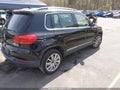 2014 Volkswagen Tiguan — photo 4 of 17 | VIN WVGBV3AX6EW510330