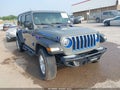 2021 Jeep Wrangler Unlimited — photo 1 of 16 | VIN 1C4HJXDGXMW522671
