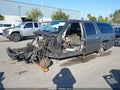 2007 Chevrolet Suburban 1500 — photo 2 of 15 | VIN 1GNFK16Y77R385674
