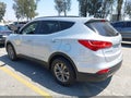 2014 Hyundai Santa Fe — photo 3 of 19 | VIN 5XYZU3LBXEG154517