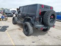 2014 Jeep Wrangler Unlimited — photo 3 of 16 | VIN 1C4BJWFG3EL225158