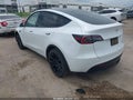 2022 Tesla Model Y — photo 3 of 16 | VIN 7SAYGAEE0NF576322