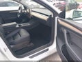 2022 Tesla Model Y — photo 5 of 16 | VIN 7SAYGAEE0NF576322