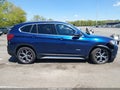 2016 BMW X1 — photo 13 of 16 | VIN WBXHT3C3XG5E52932