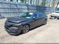 2024 Honda Civic — photo 2 of 15 | VIN 2HGFE1F73RH335737