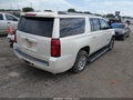 2015 Chevrolet Suburban 1500 — photo 4 of 17 | VIN 1GNSKKKCXFR206010