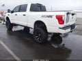 2016 Nissan Titan — photo 3 of 11 | VIN 1N6BA1F41GN513340
