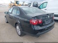 2009 Volkswagen Jetta — photo 3 of 11 | VIN 3VWRJ71K59M008518