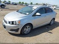 2014 Chevrolet Sonic — photo 2 of 12 | VIN 1G1JC5SG9E4104711