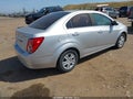 2014 Chevrolet Sonic — photo 4 of 12 | VIN 1G1JC5SG9E4104711