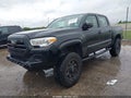 2018 Toyota Tacoma — photo 2 of 16 | VIN 5TFAX5GN2JX116825