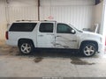 2013 Chevrolet Suburban 1500 — photo 13 of 16 | VIN 1GNSCJE08DR297798