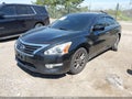 2015 Nissan Altima — photo 2 of 16 | VIN 1N4AL3AP8FC587313