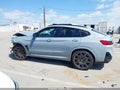 2022 BMW X4 — photo 14 of 16 | VIN 5YM23EC05N9N03400