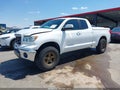 2012 Toyota Tundra — photo 2 of 17 | VIN 5TFRM5F11CX048529