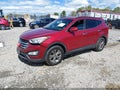 2016 Hyundai Santa Fe — photo 2 of 17 | VIN 5XYZUDLBXGG327610
