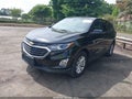 2018 Chevrolet Equinox — photo 2 of 16 | VIN 2GNAXJEV0J6301300