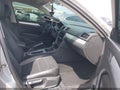 2013 Volkswagen Passat — photo 5 of 17 | VIN 1VWBP7A39DC087730
