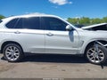 2014 BMW X5 — photo 13 of 16 | VIN 5UXKR0C58E0K51800