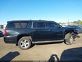 2016 Chevrolet Suburban — photo 12 of 15 | VIN 1GNSKHKC0GR318139