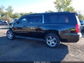 2016 Chevrolet Suburban — photo 13 of 15 | VIN 1GNSKHKC0GR318139