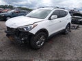 2018 Hyundai Santa Fe — photo 2 of 17 | VIN 5XYZU3LB7JG558451