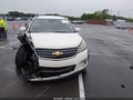 2014 Chevrolet Traverse — photo 12 of 16 | VIN 1GNKRHKD1EJ178649