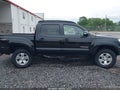 2013 Toyota Tacoma — photo 13 of 16 | VIN 3TMLU4EN7DM123570