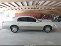 2004 Lincoln Town Car — photo 13 of 16 | VIN 1LNHM81W24Y669799