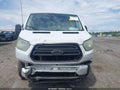 2016 Ford Transit-150 — photo 13 of 18 | VIN 1FTYE1ZM4GKA16829