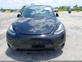 2023 Tesla Model Y — photo 12 of 19 | VIN 7SAYGDEE3PA157883
