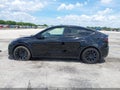 2023 Tesla Model Y — photo 14 of 19 | VIN 7SAYGDEE3PA157883