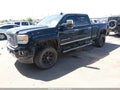 2016 GMC Sierra — photo 2 of 16 | VIN 1GT12UE81GF131465