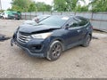 2013 Hyundai Santa Fe — photo 2 of 12 | VIN 5XYZU3LB8DG006347