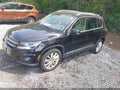 2013 Volkswagen Tiguan — photo 2 of 16 | VIN WVGAV3AXODW597118