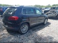 2013 Volkswagen Tiguan — photo 4 of 16 | VIN WVGAV3AXODW597118