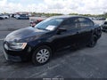 2014 Volkswagen Jetta — photo 2 of 16 | VIN 3VW1K7AJ3EM442822