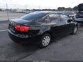 2014 Volkswagen Jetta — photo 4 of 16 | VIN 3VW1K7AJ3EM442822