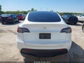2023 Tesla Model Y — photo 16 of 19 | VIN 7SAYGDEE9PA038140