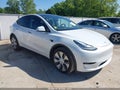 2023 Tesla Model Y — photo 1 of 19 | VIN 7SAYGDEE9PA038140